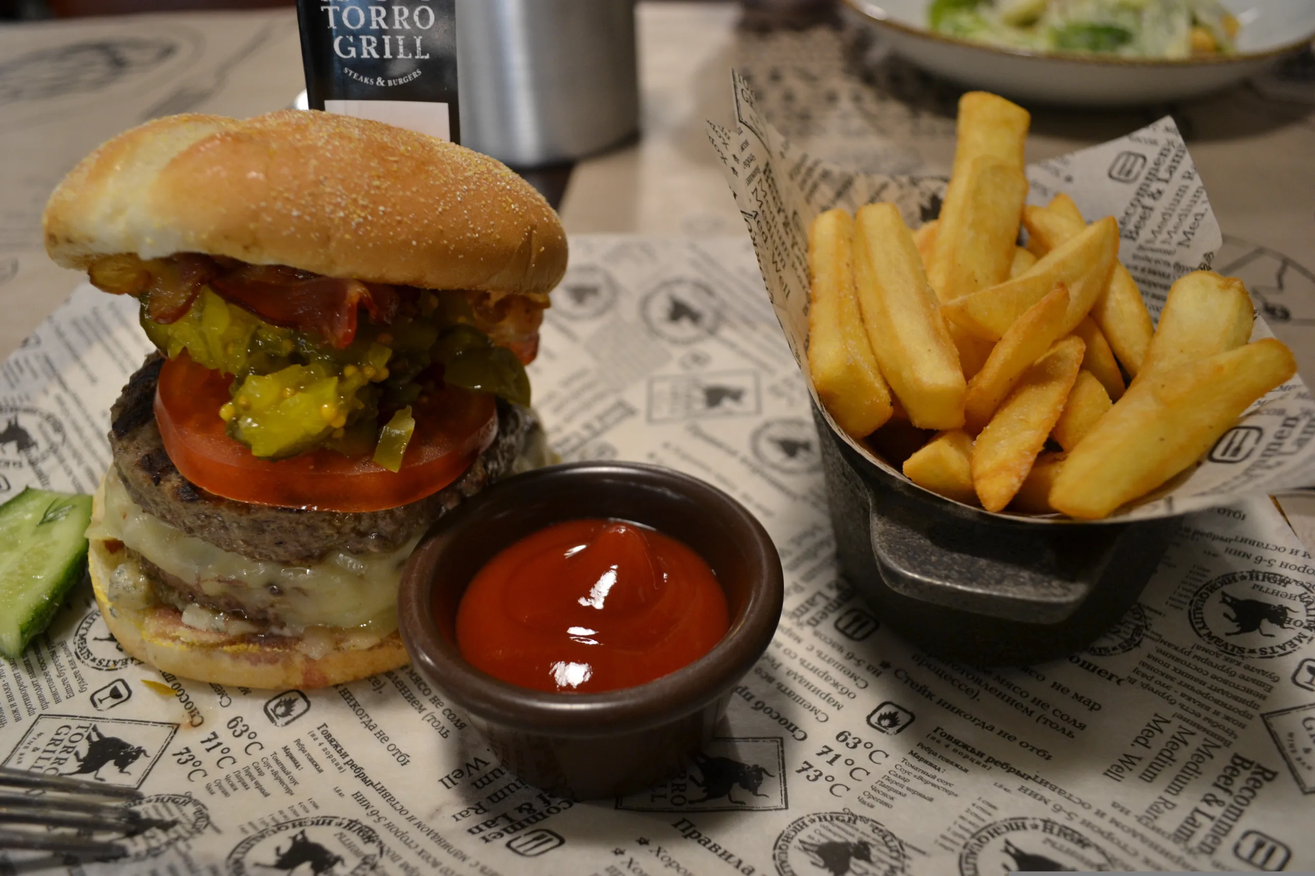 Burger with chips and tomato sauce